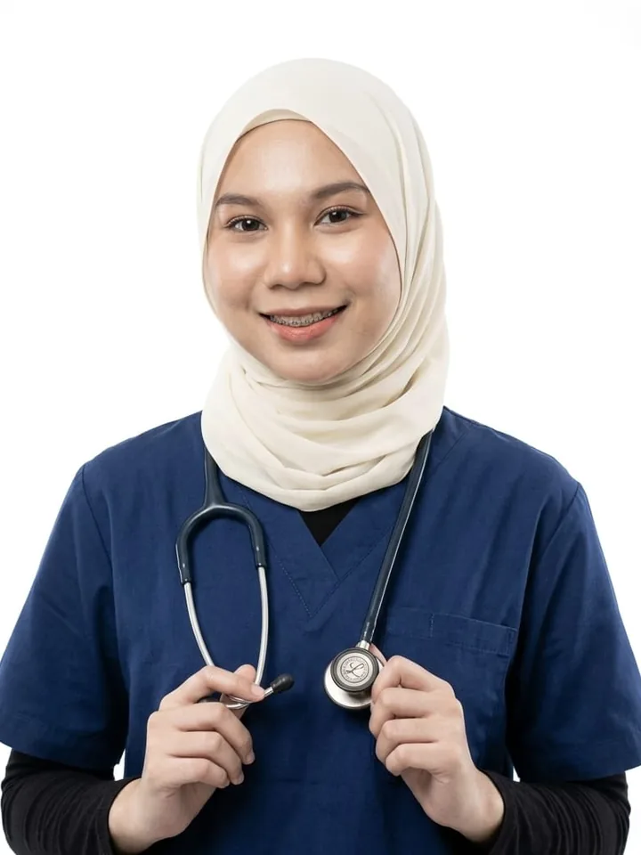 Locum nurse in navy scrubs holding a stethoscope